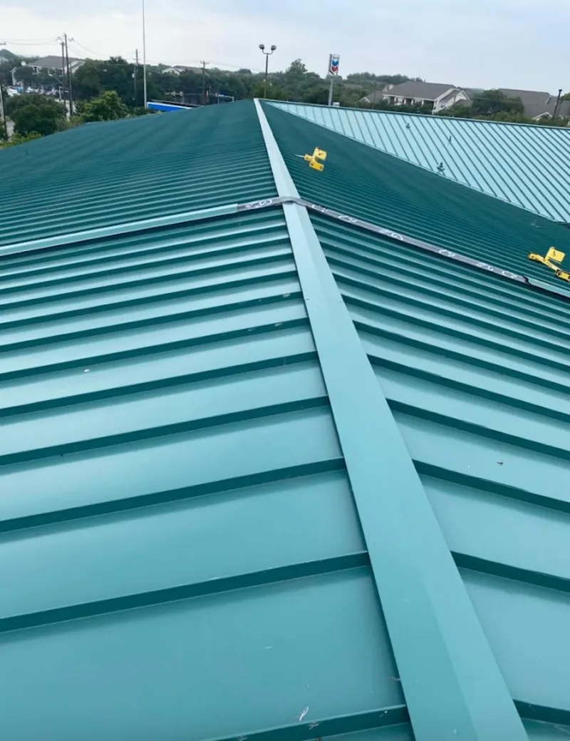 Green commercial metal roof ridge and valley for Metal Roof Repair in Valencia West